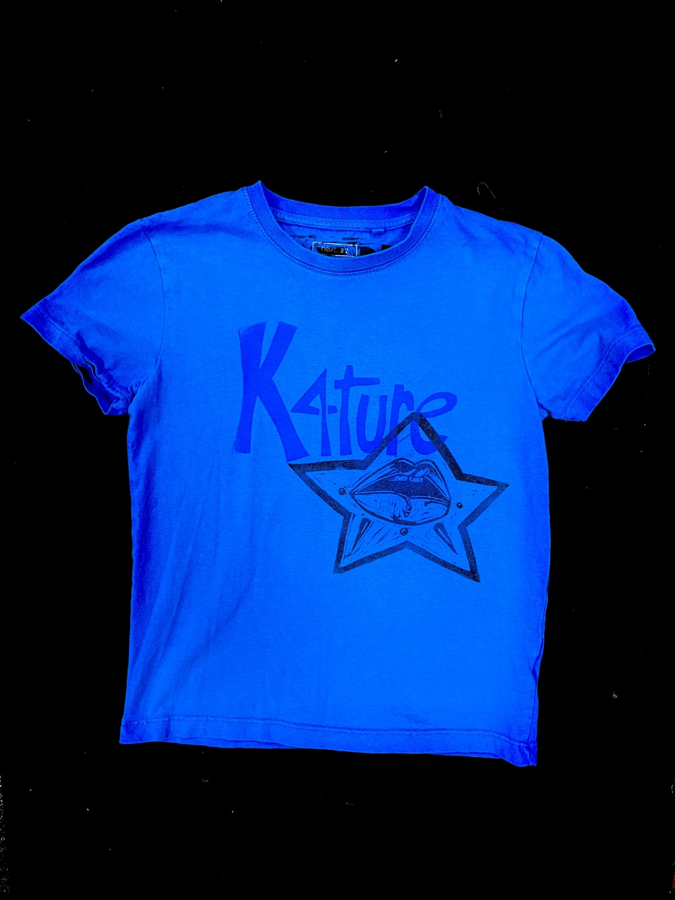 Blue K4TURE baby tee with star lips design