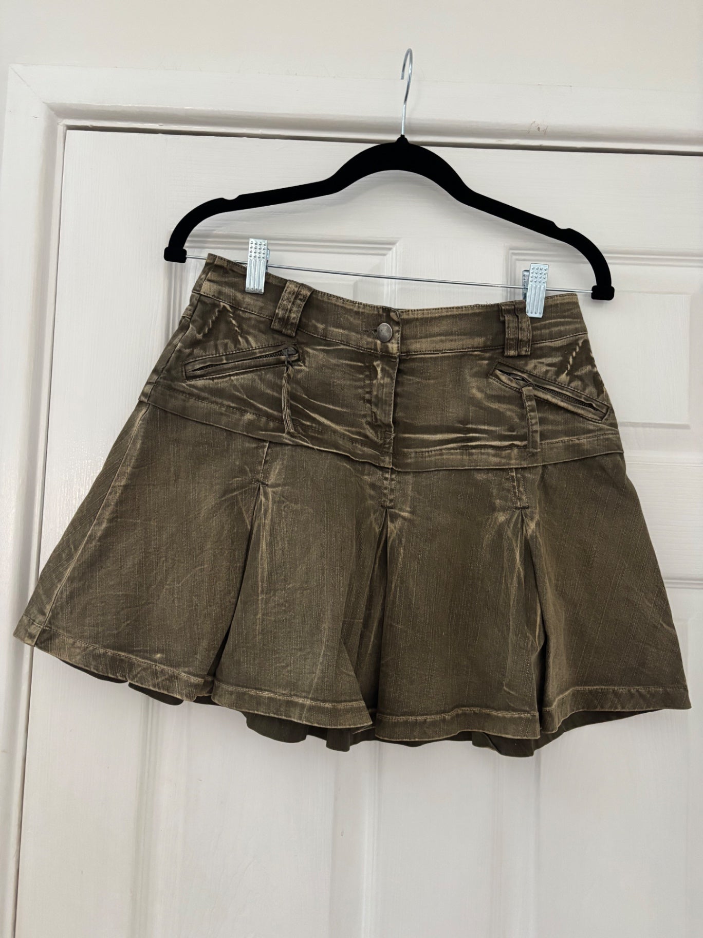Green washed pleated denim skirt
