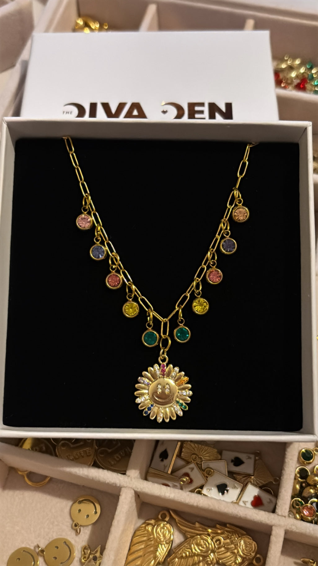 Colourful smiling sun necklace