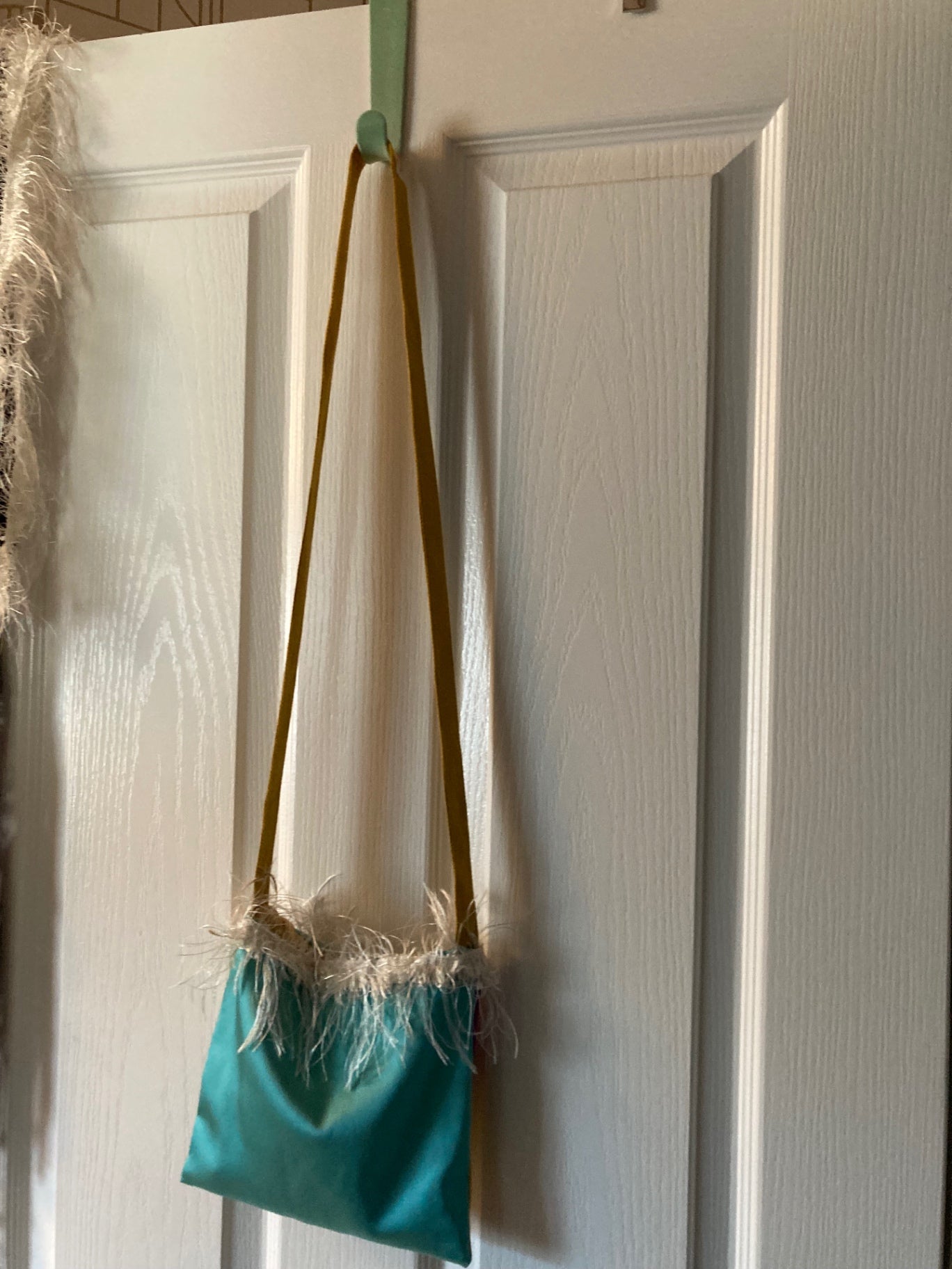 Mini 4 sq front, turquoise reverse, cross body bag white fluff trim