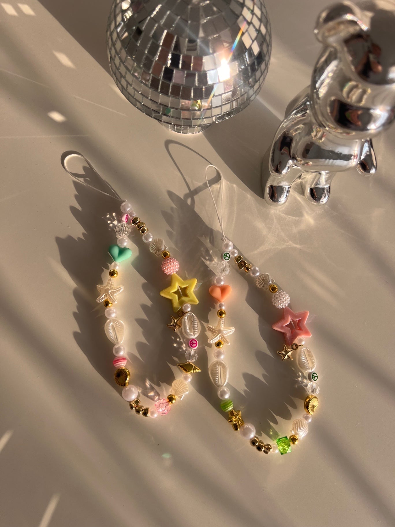 Bright Pearl phone charm - gold