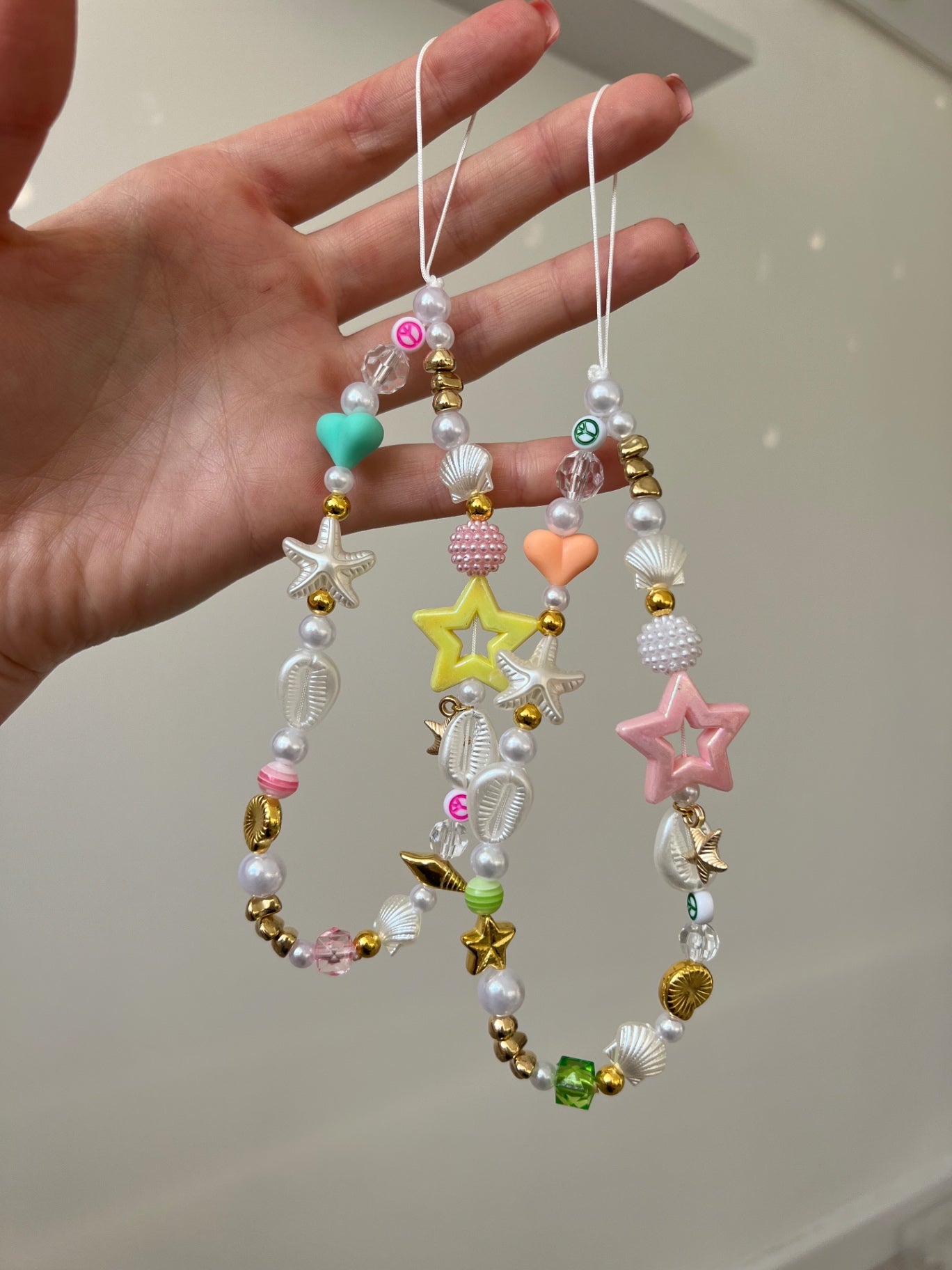 Bright Pearl phone charm - gold