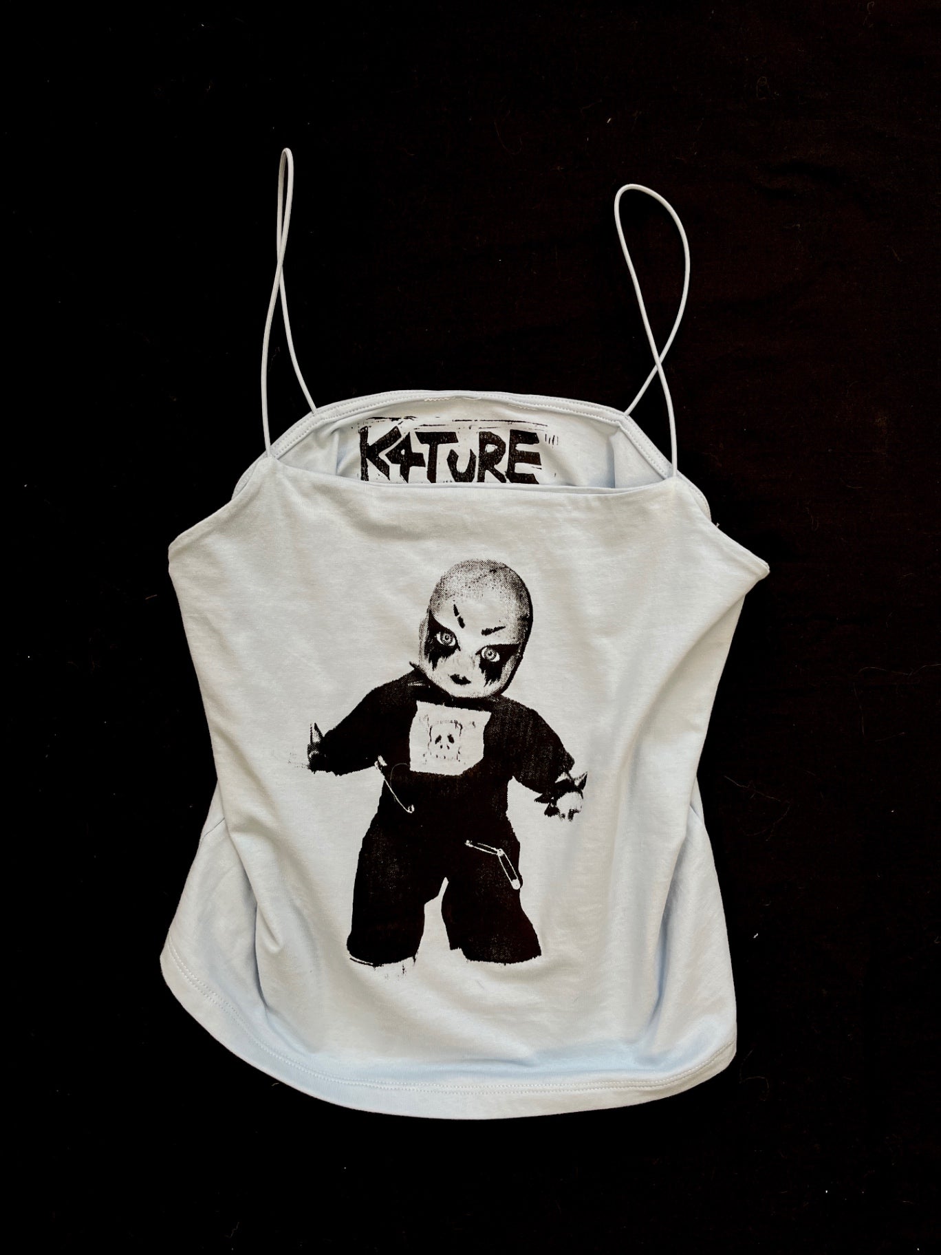 K4TURE light blue spaghetti strap top with baby graphic