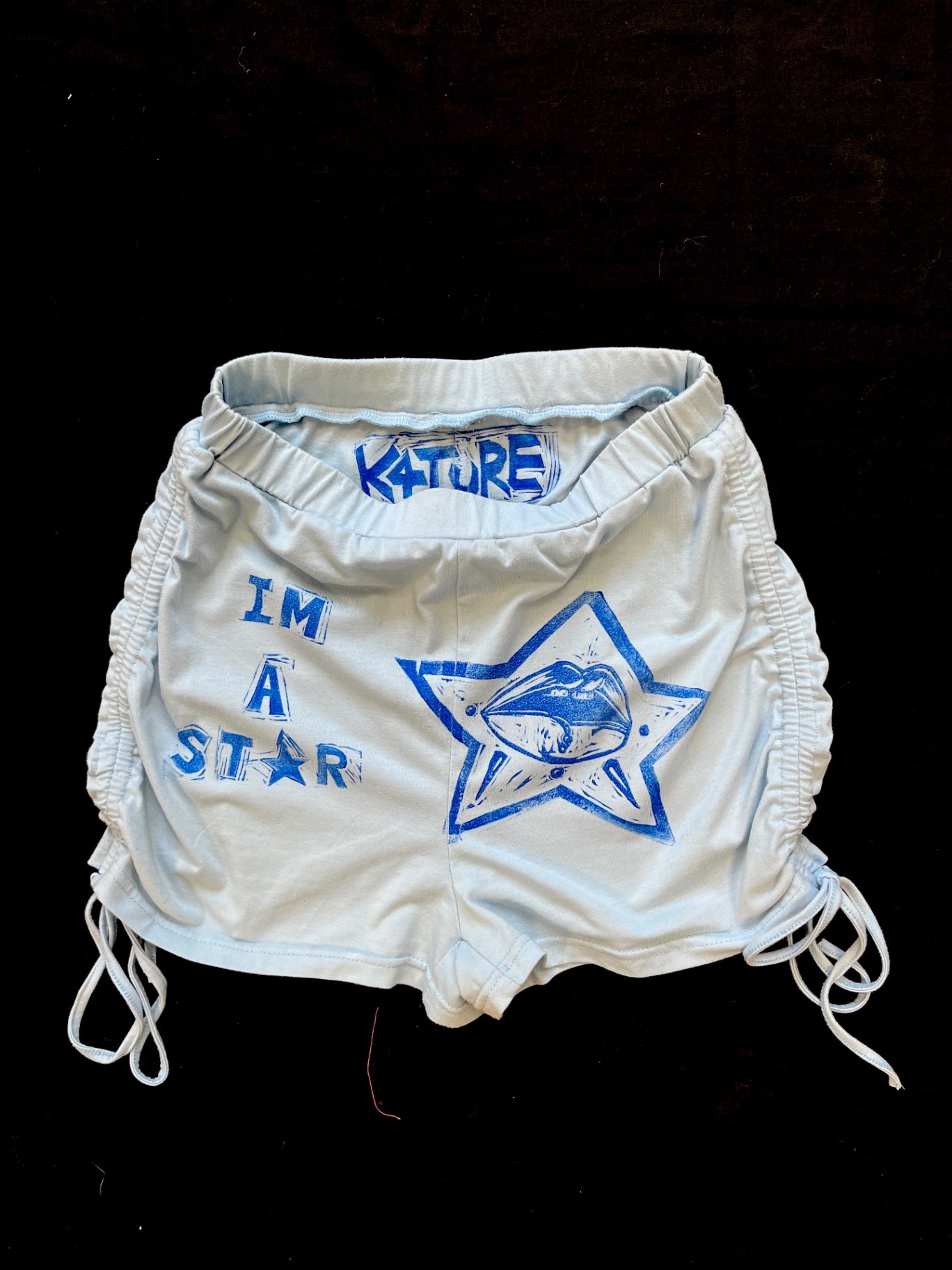 K4TURE ‘I’m a star’ light blue shorts (size 6)