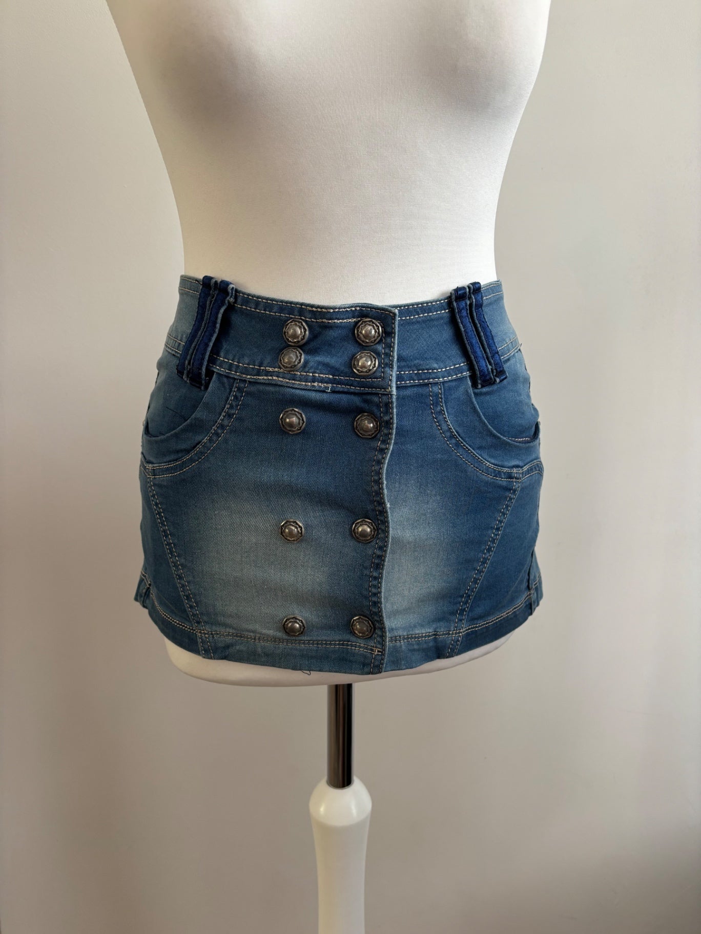 Pleated denim mini skirt