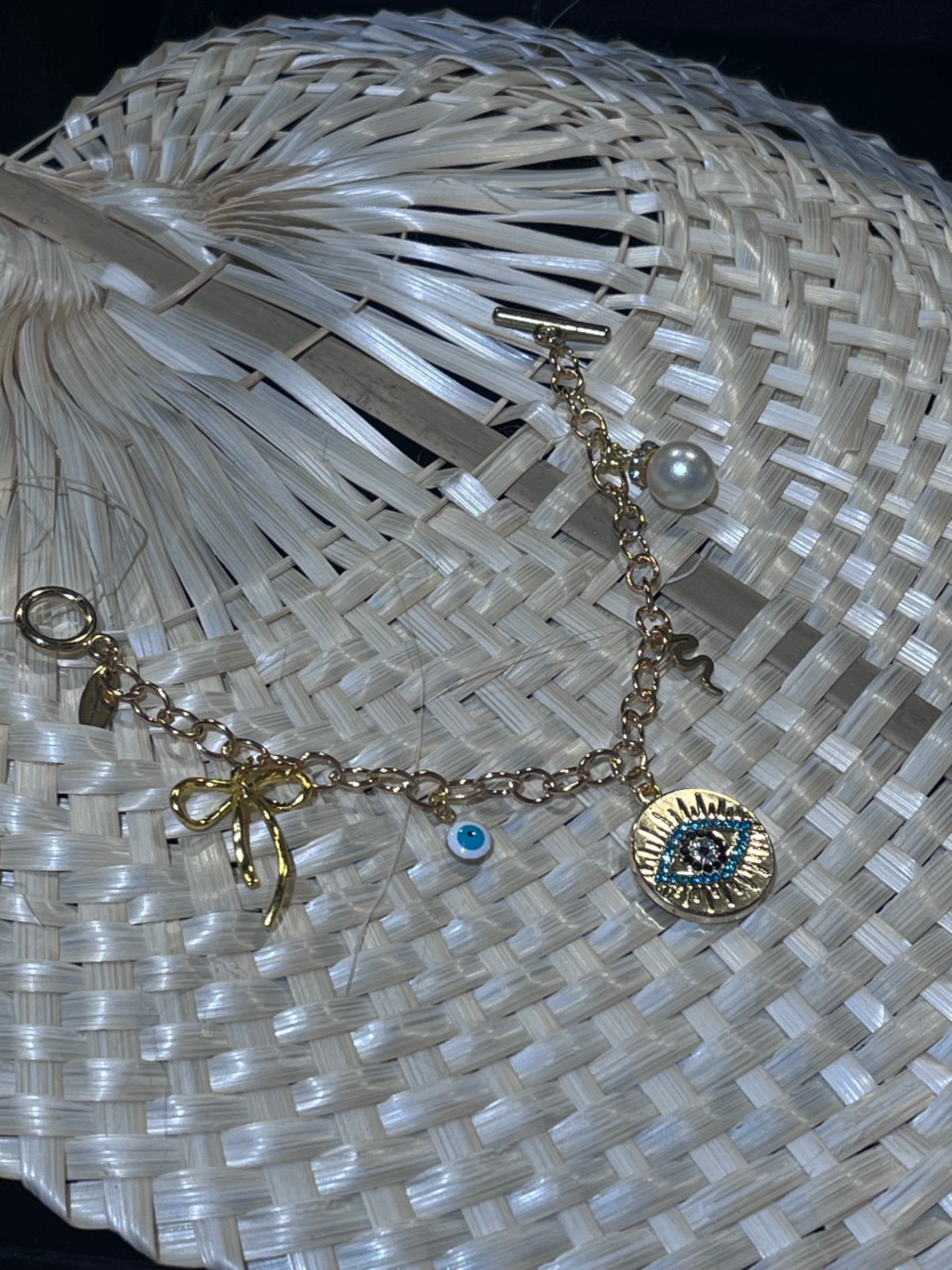 Mystic Bow & Evil Eye T-Bar Charm Bracelet – Gold