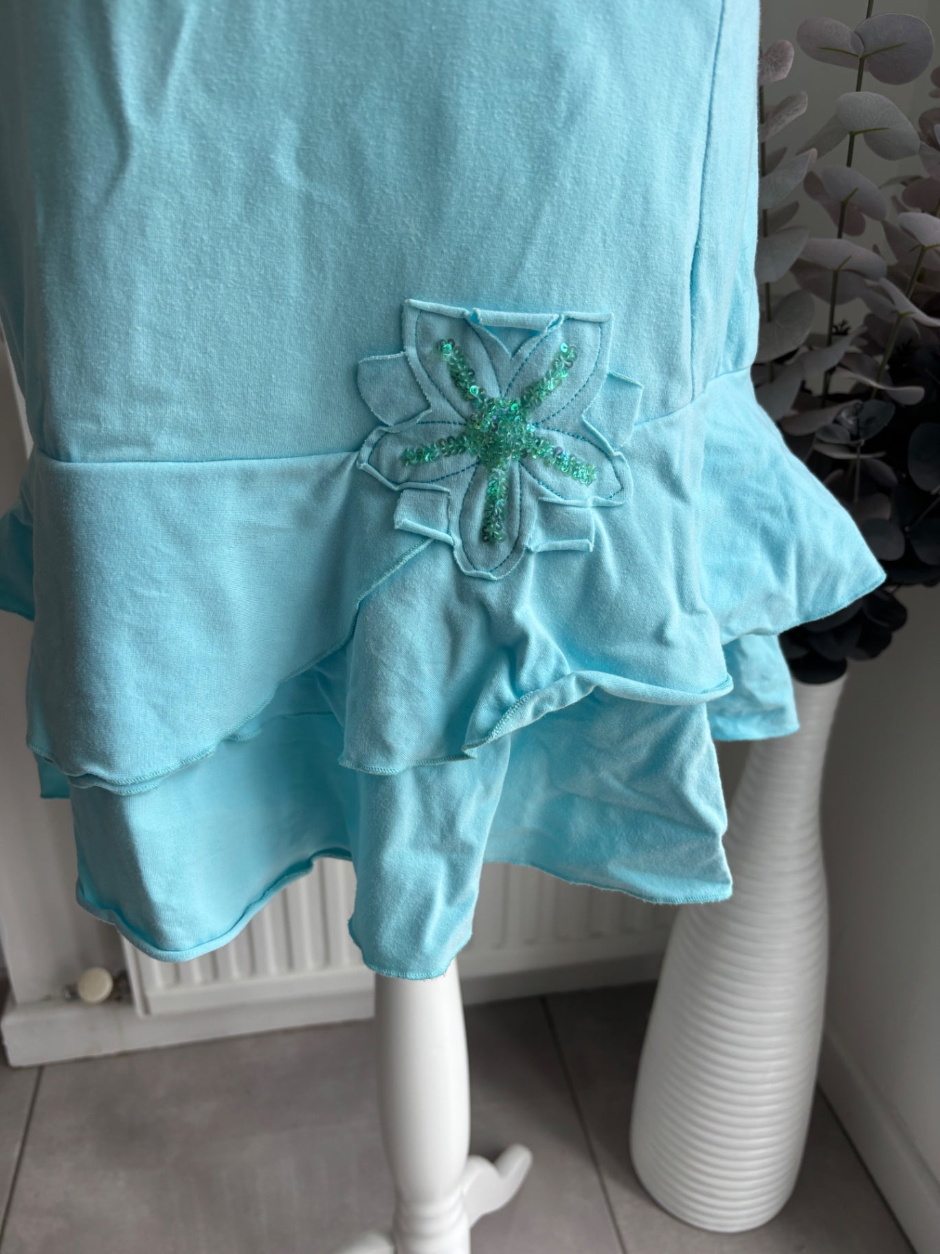 Blue dress with straps and flower size 12