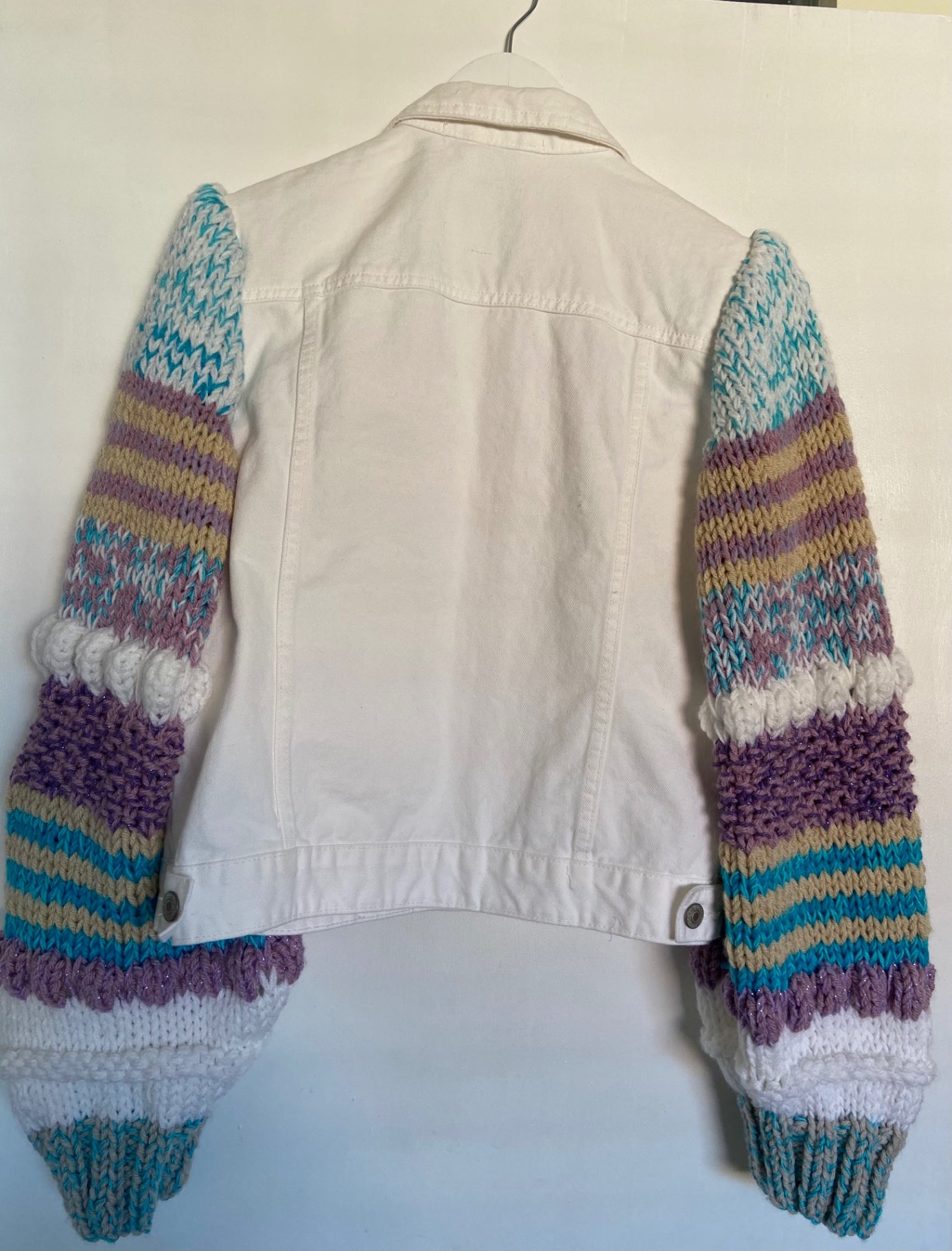 White Jean Jacket With Multi Coloured hand knit sleeves