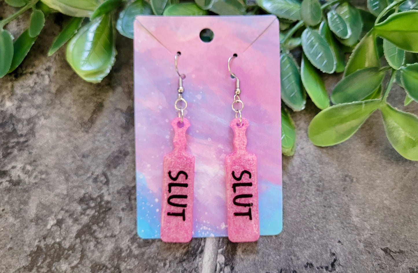 Pink Glitter Paddle Earrings – “SLUT” Indent Text – Alt NSFW Statement Jewellery