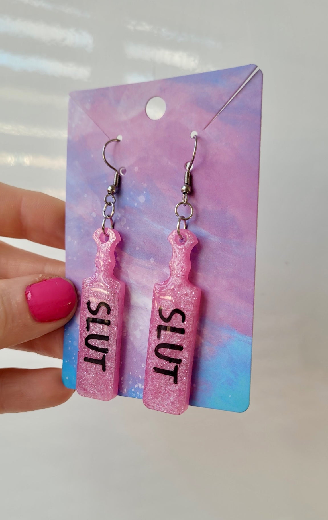 Pink Glitter Paddle Earrings – “SLUT” Indent Text – Alt NSFW Statement Jewellery