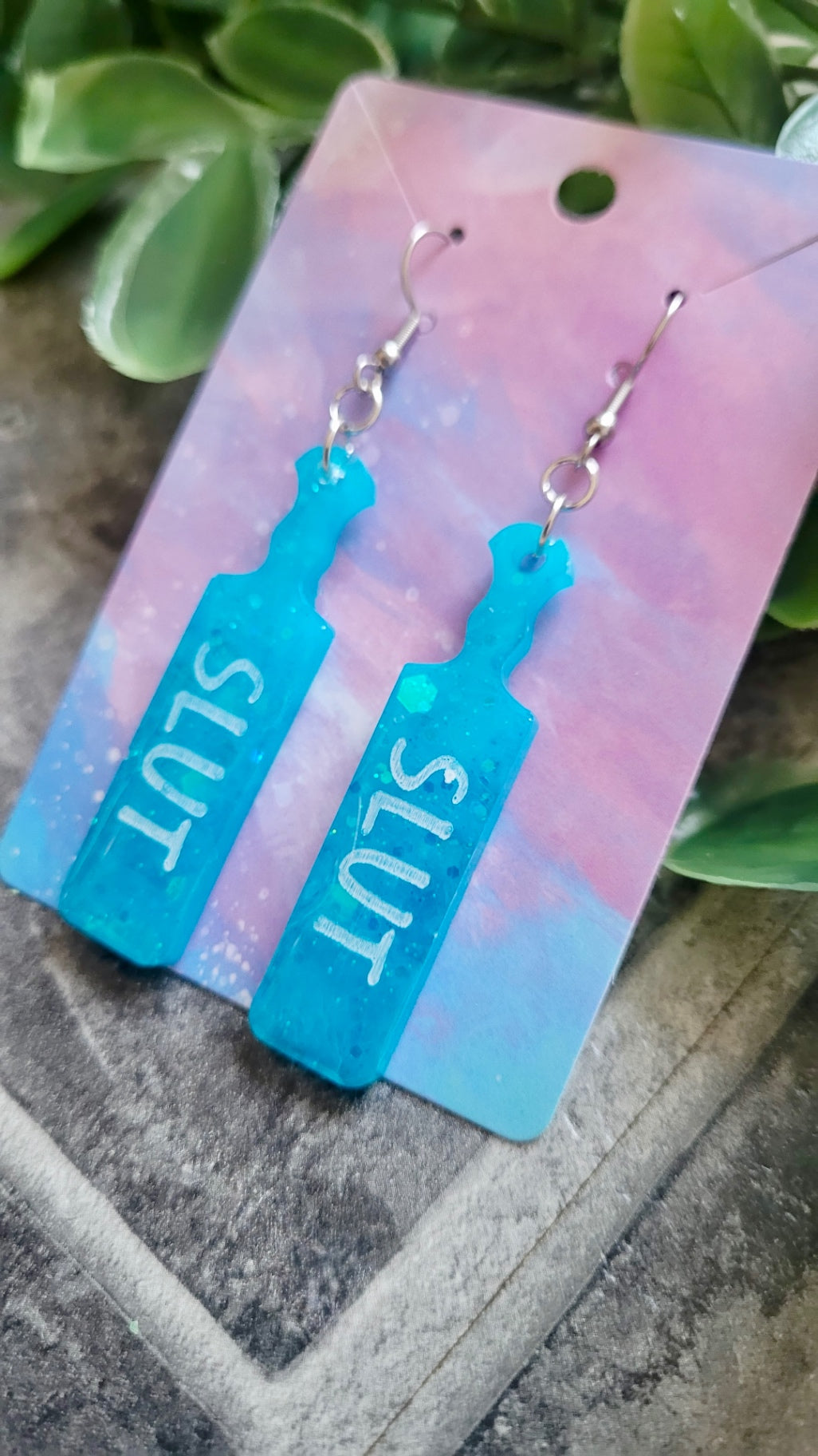 Turquoise Blue Glitter Paddle Earrings – “SLUT” in White Text | Handmade Alt Resin Jewellery
