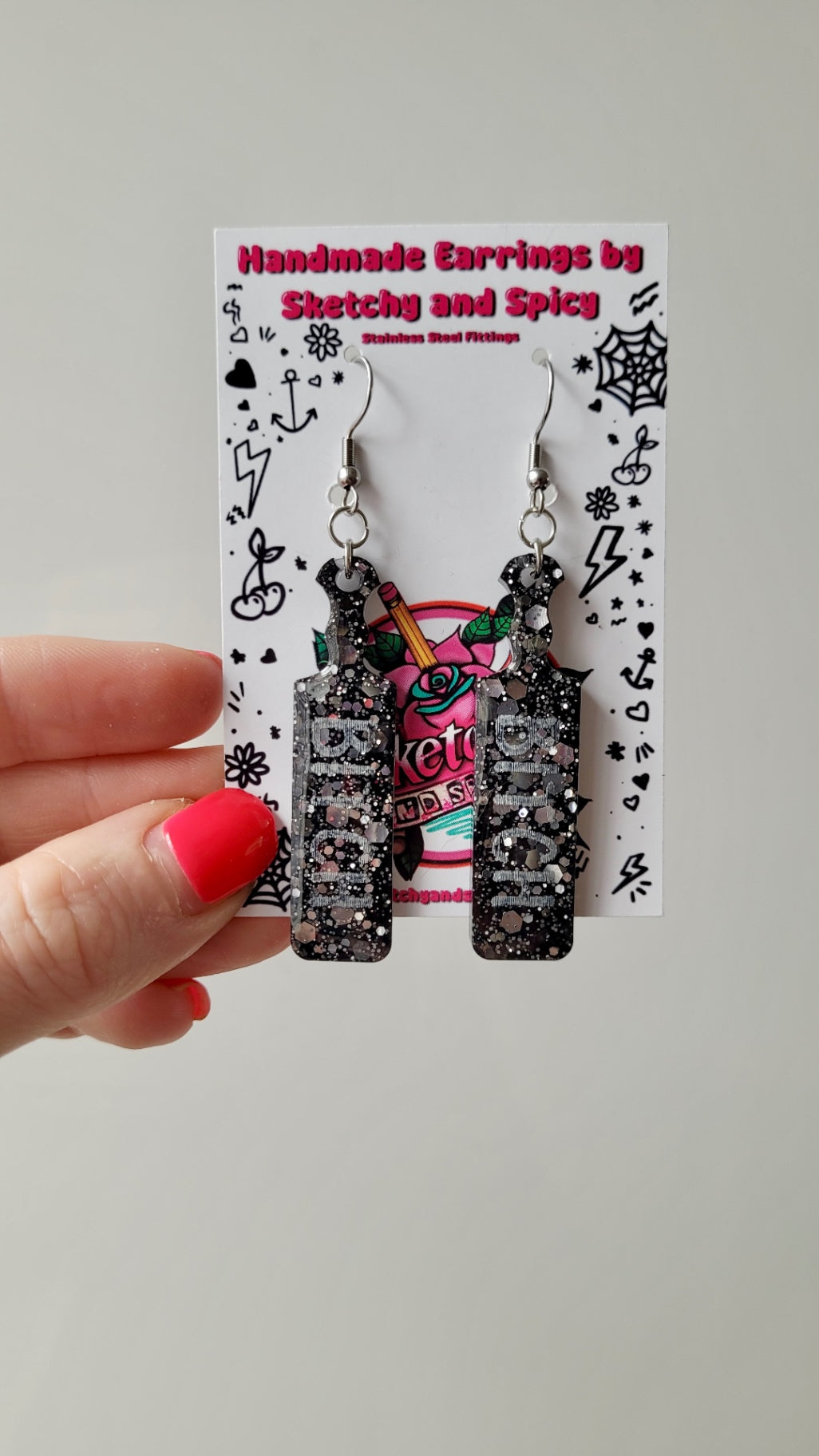 Black Glitter Paddle Earrings – “BITCH” Silver Text - with Stainless Steel Silver Hooks