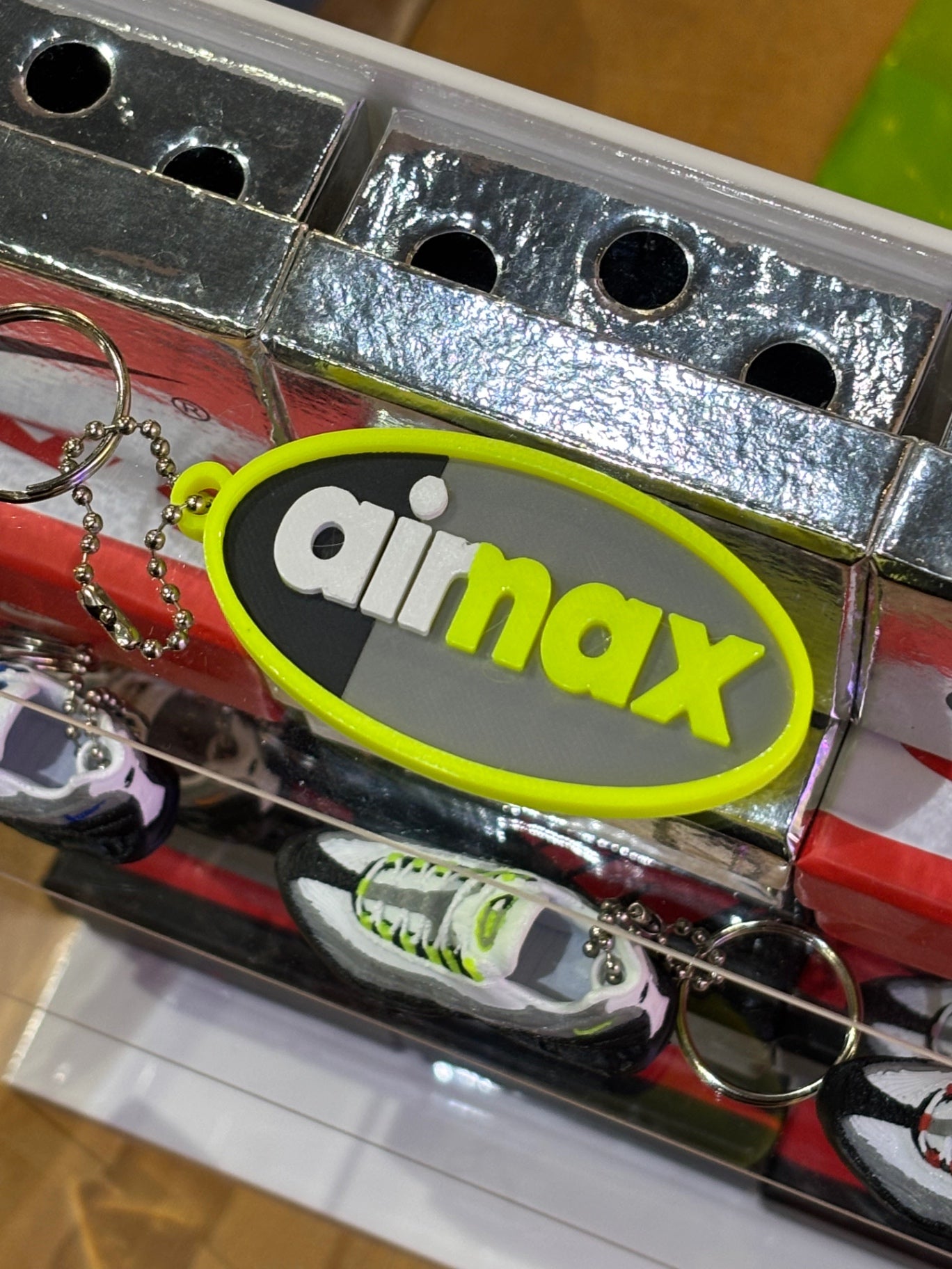 110 logo keychain neon