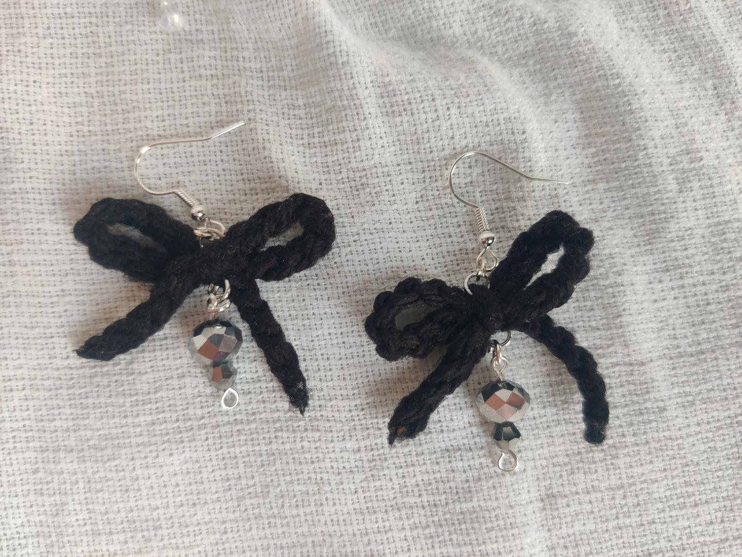 Black crochet bow earrings, disco beads