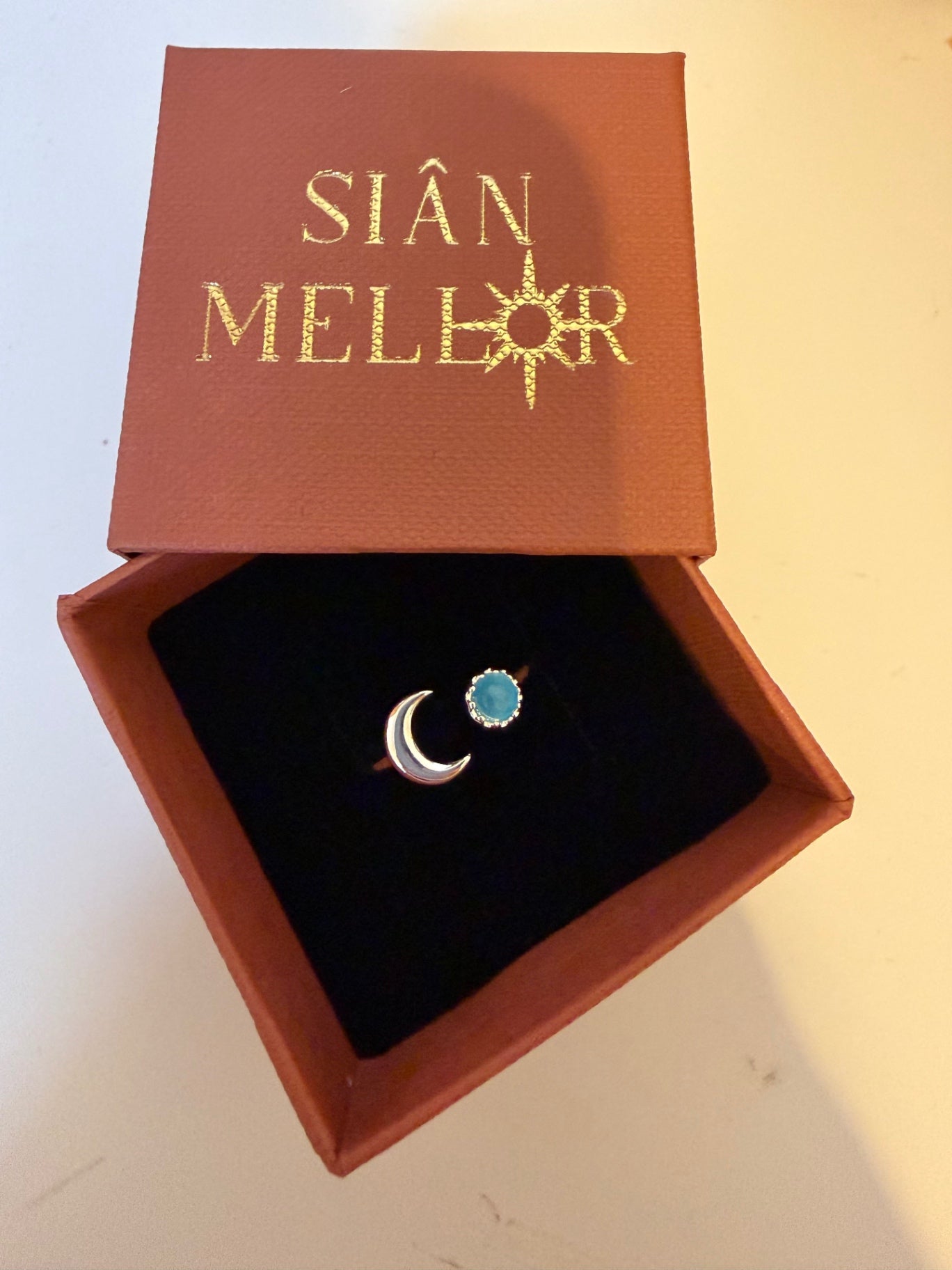 Extendable moon and blue stone silver ring