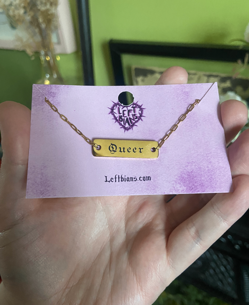 Gold queer engraved necklace