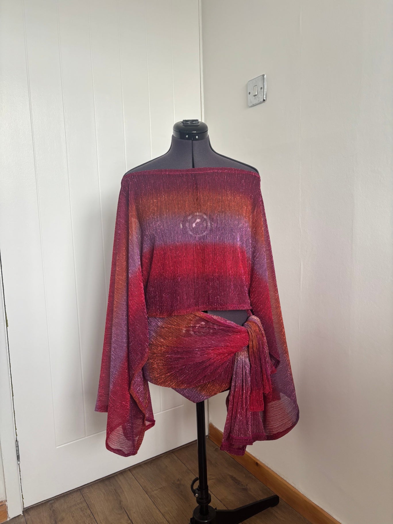 poncho top and sarong skirt
