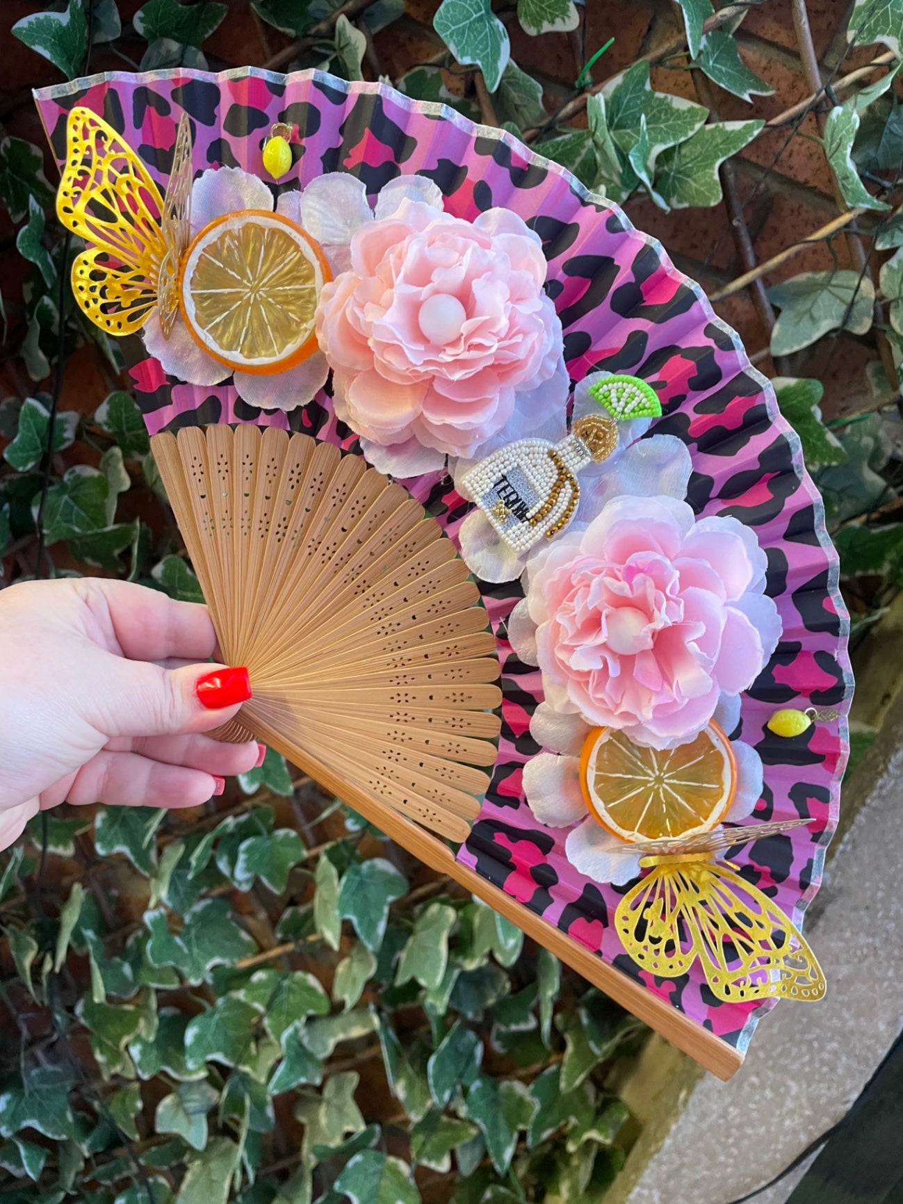 Leopard embellished folding fan