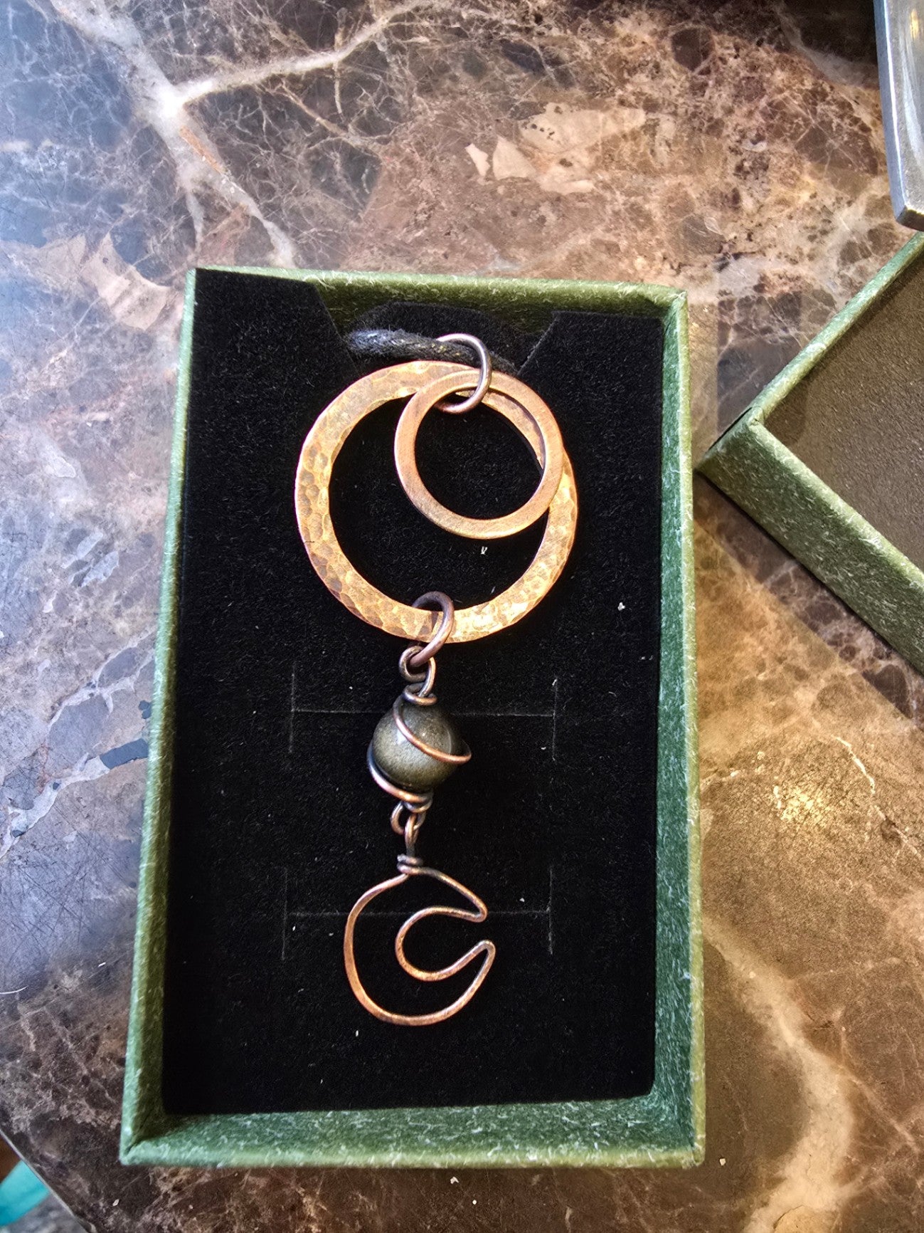 Simple golden sheen obsidian copper pendant 