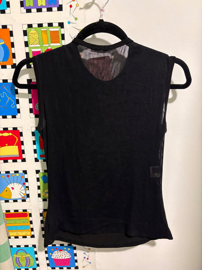 Black sleeveless top with graphic on 