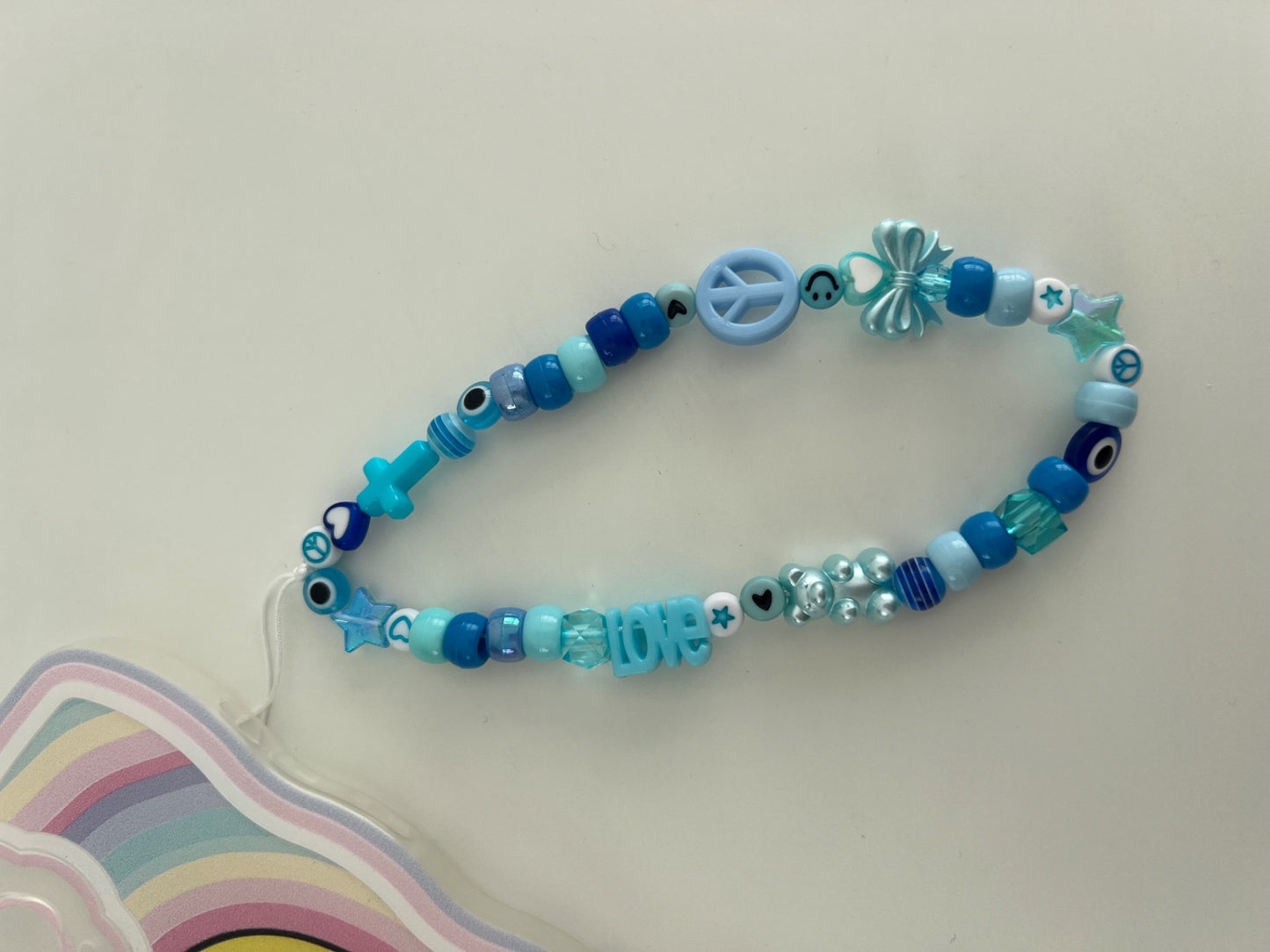 Inspire phone charm - blue