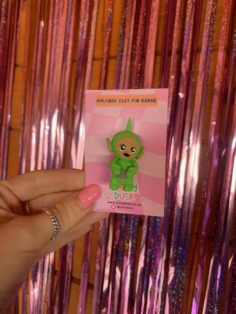 green tubby polymer clay badge