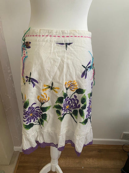 White skirt with flowers on 