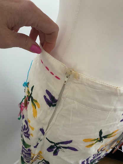 White skirt with flowers on 