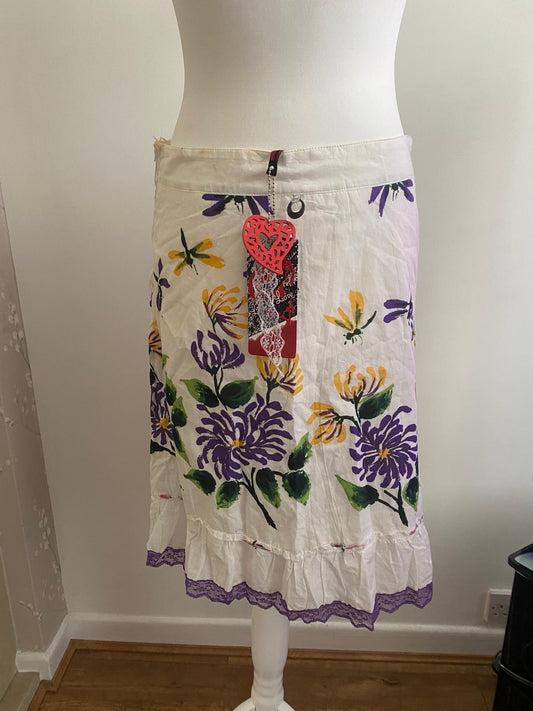 White skirt with flowers on 