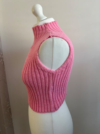 Pink knitted turtle neck sleeveless top