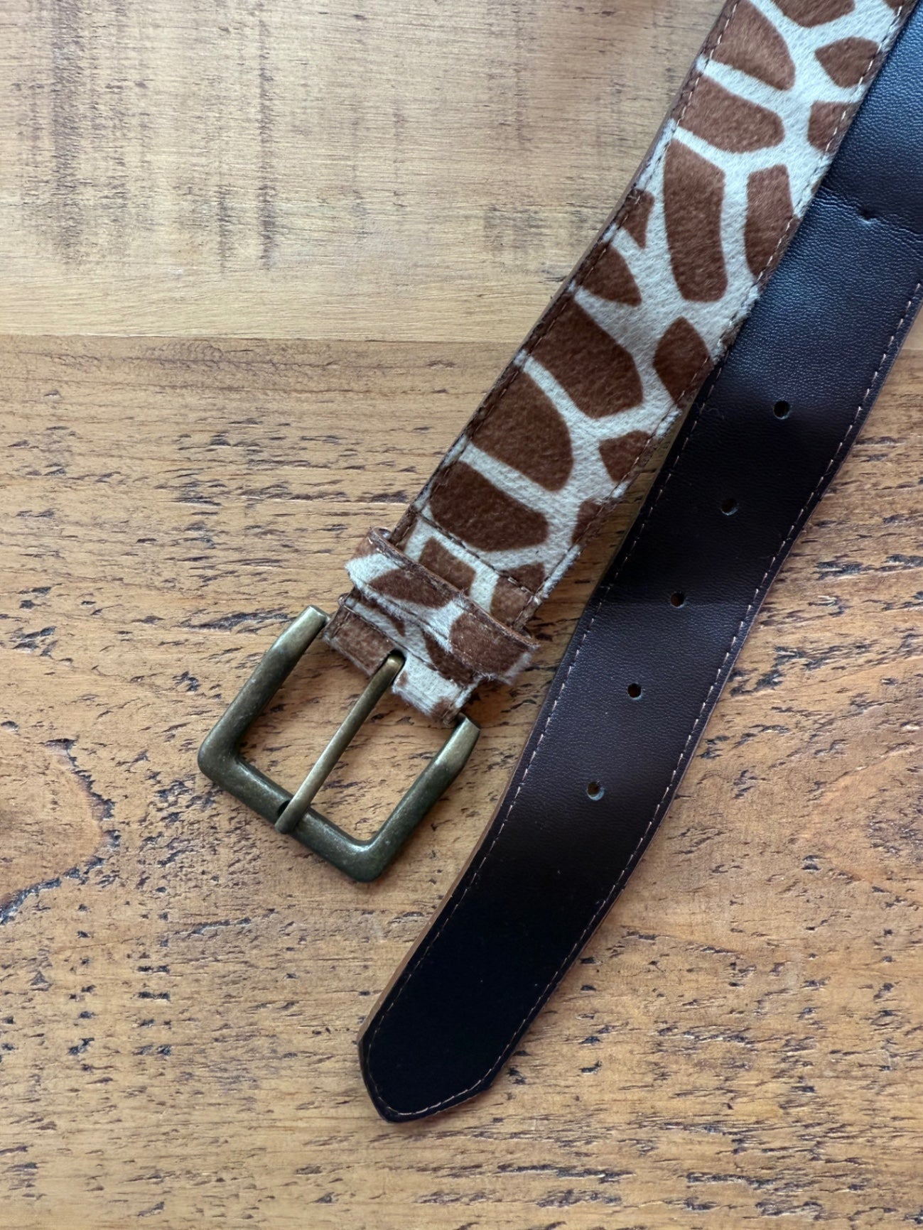Preloved cow print belt