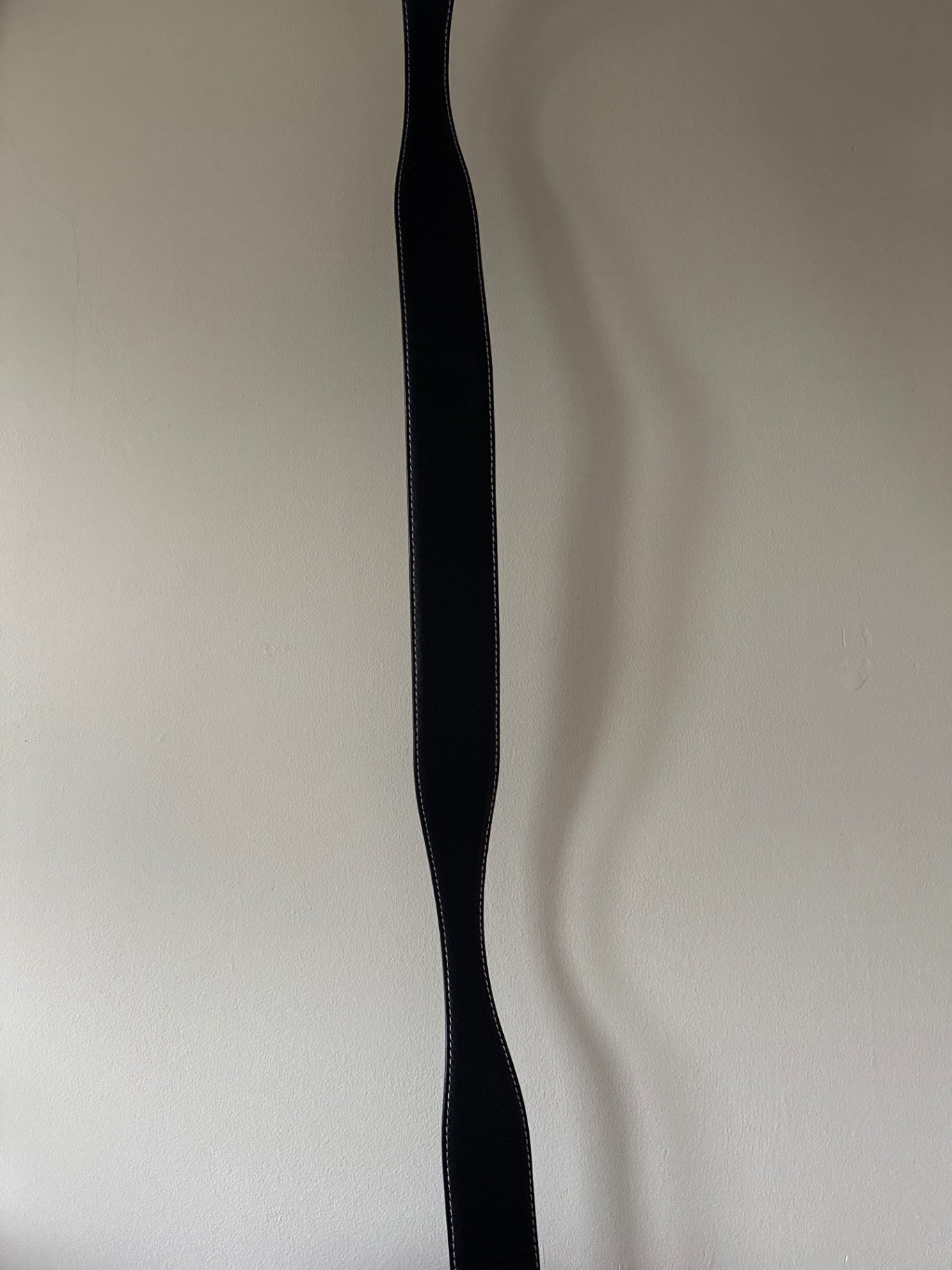 Black curved belt 