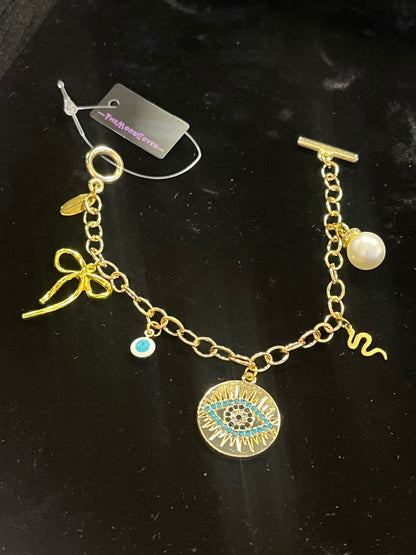 Mystic Bow & Evil Eye T-Bar Charm Bracelet – Gold
