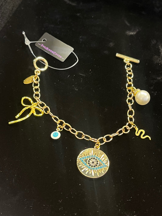 Mystic Bow & Evil Eye T-Bar Charm Bracelet – Gold