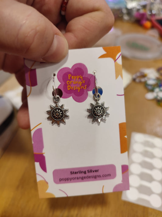 Sun medallion hoops