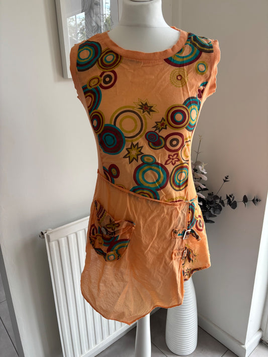 Orange shirt top with colourful swirls 