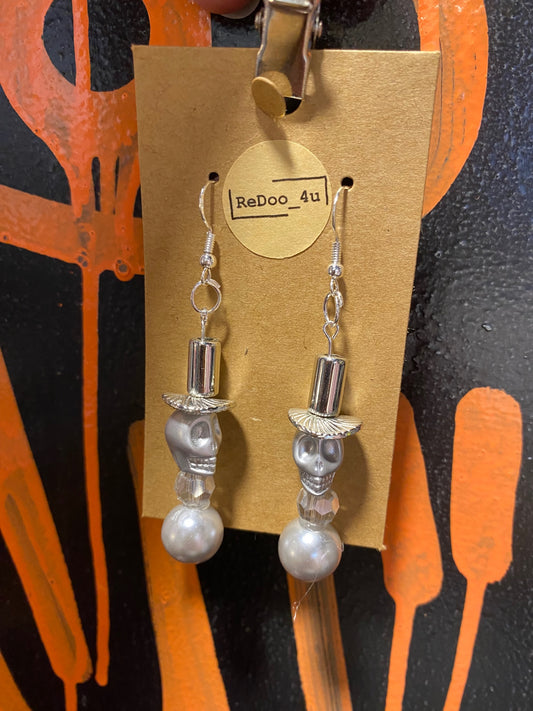 Silver skulls