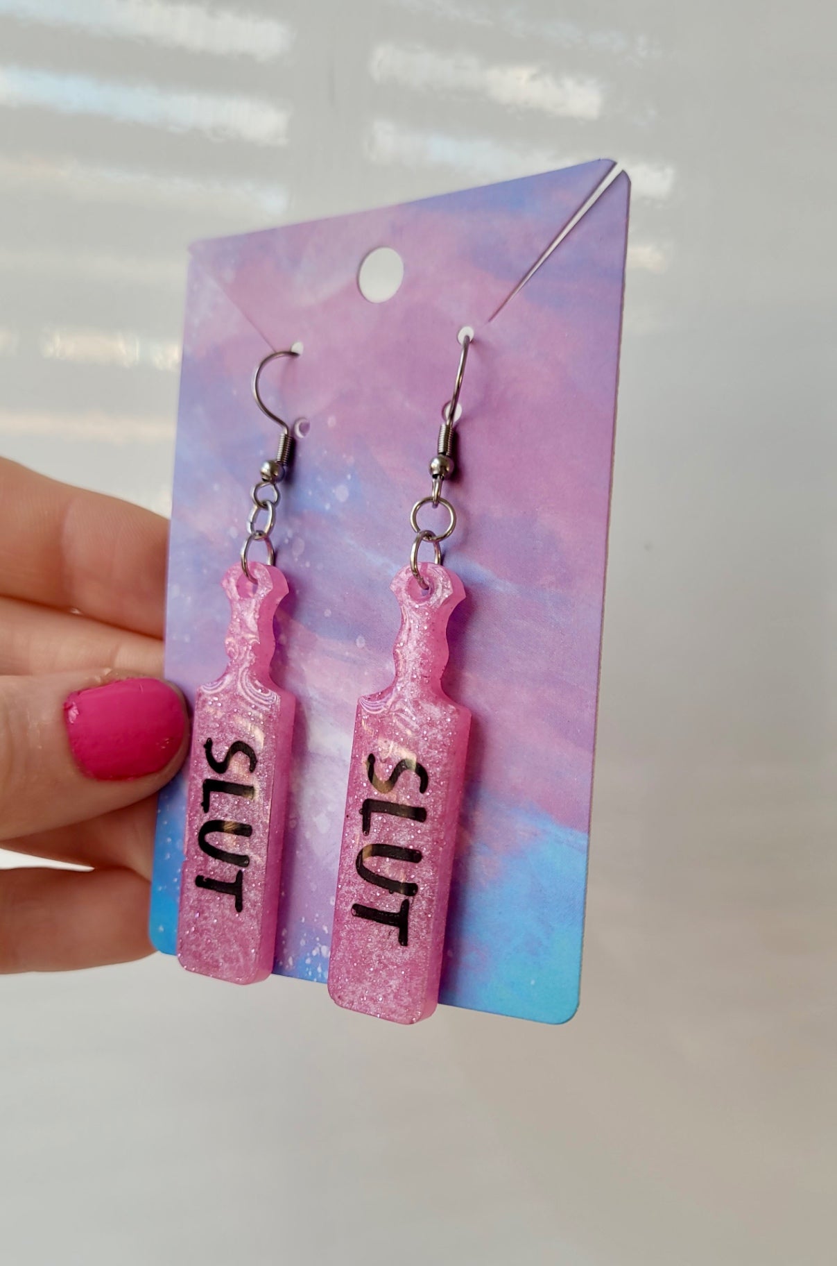 Pink Glitter Paddle Earrings – “SLUT” Indent Text – Alt NSFW Statement Jewellery