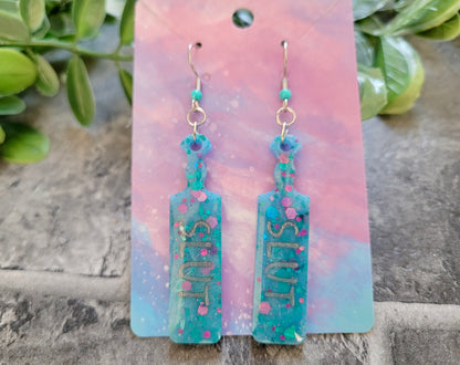 SLUT Paddle Earrings – Blue Resin Glitter Statement Jewellery by Sketchy & Spicy