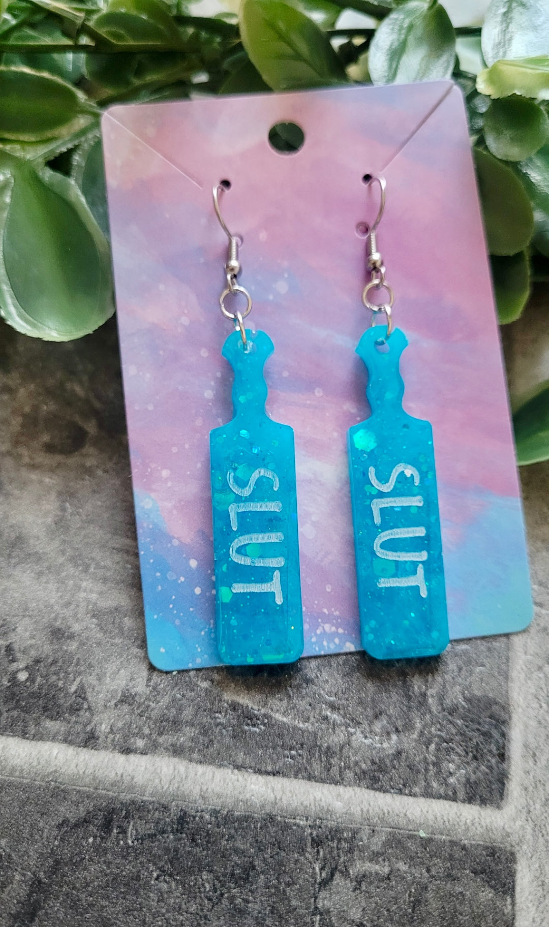 Turquoise Blue Glitter Paddle Earrings – “SLUT” in White Text | Handmade Alt Resin Jewellery