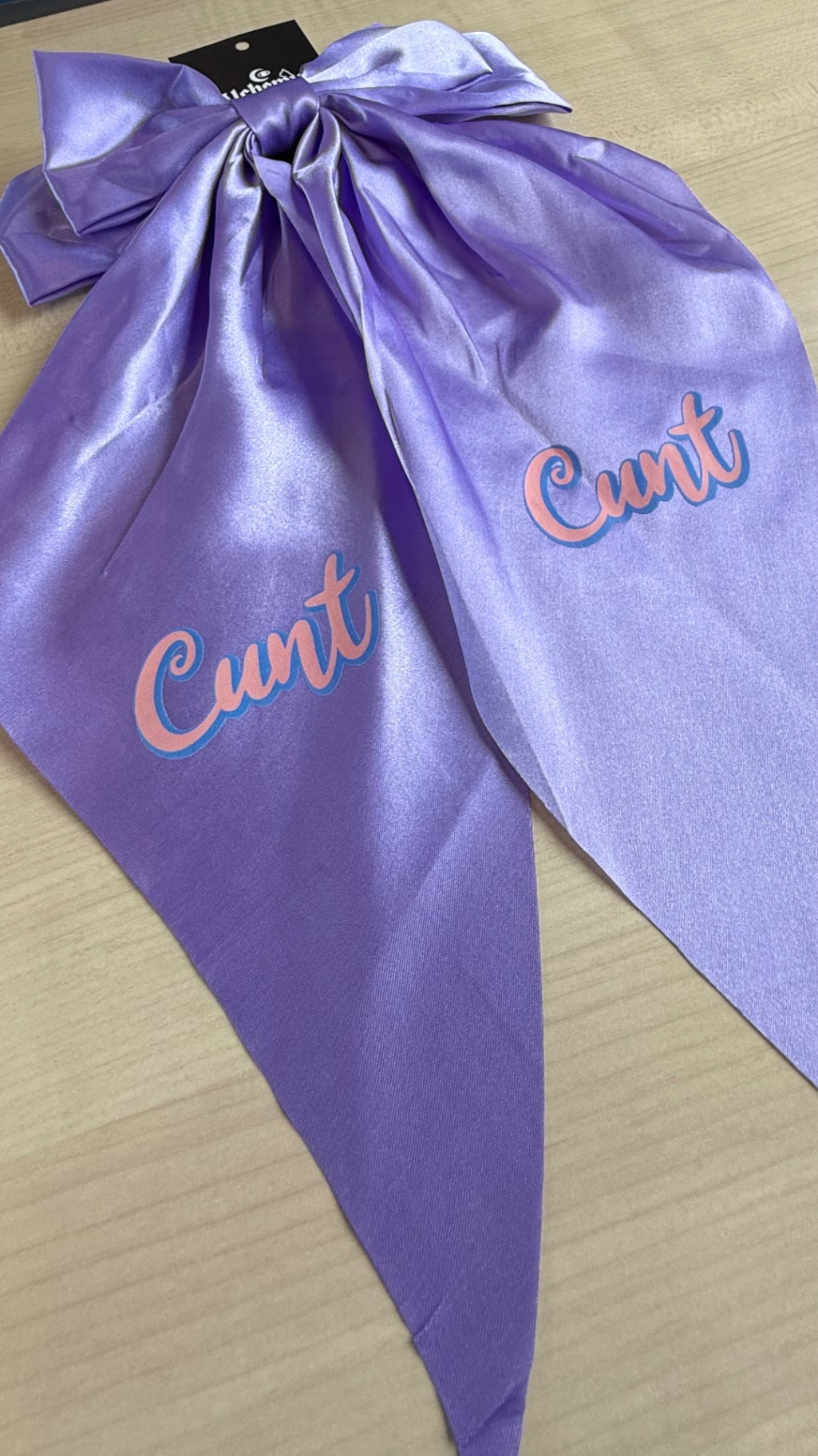 Purple satin Cunt hair bow