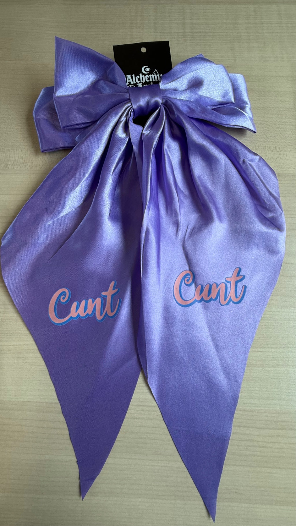 Purple satin Cunt hair bow