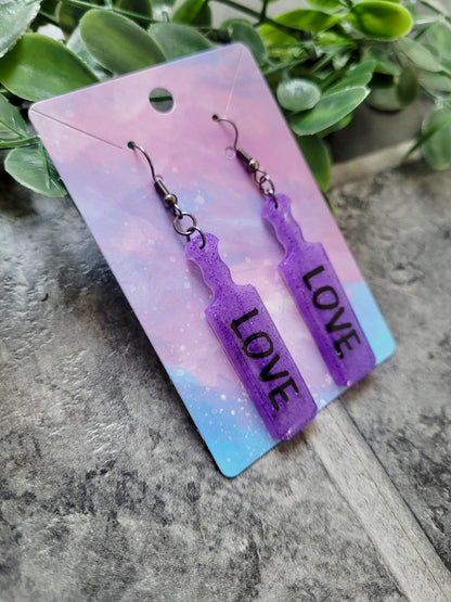 Purple Glitter Paddle Earrings – “LOVE” 