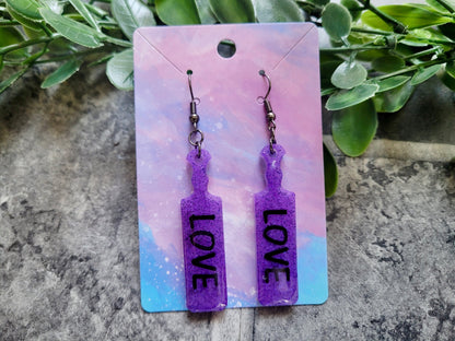 Purple Glitter Paddle Earrings – “LOVE” 