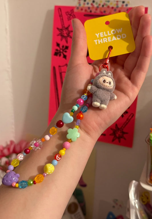 Brown bubu charm 
