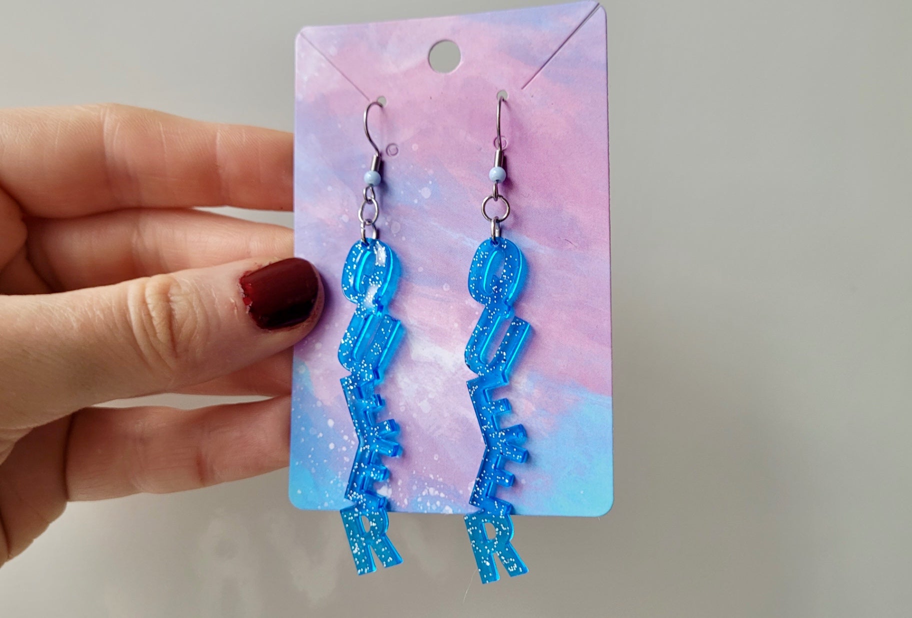 Light Blue Glitter “QUEER” Dangle Earrings with Shepherd Hooks – LGBTQ+ Statement