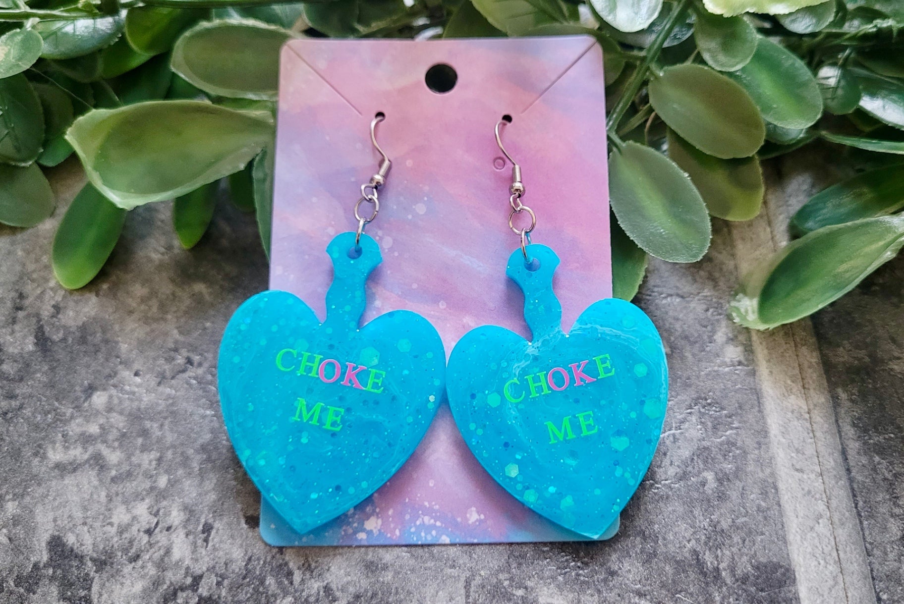 CHOKE ME Light Blue Glitter Heart Paddle Earrings with Green & Pink Text - Stainless Steel Hooks