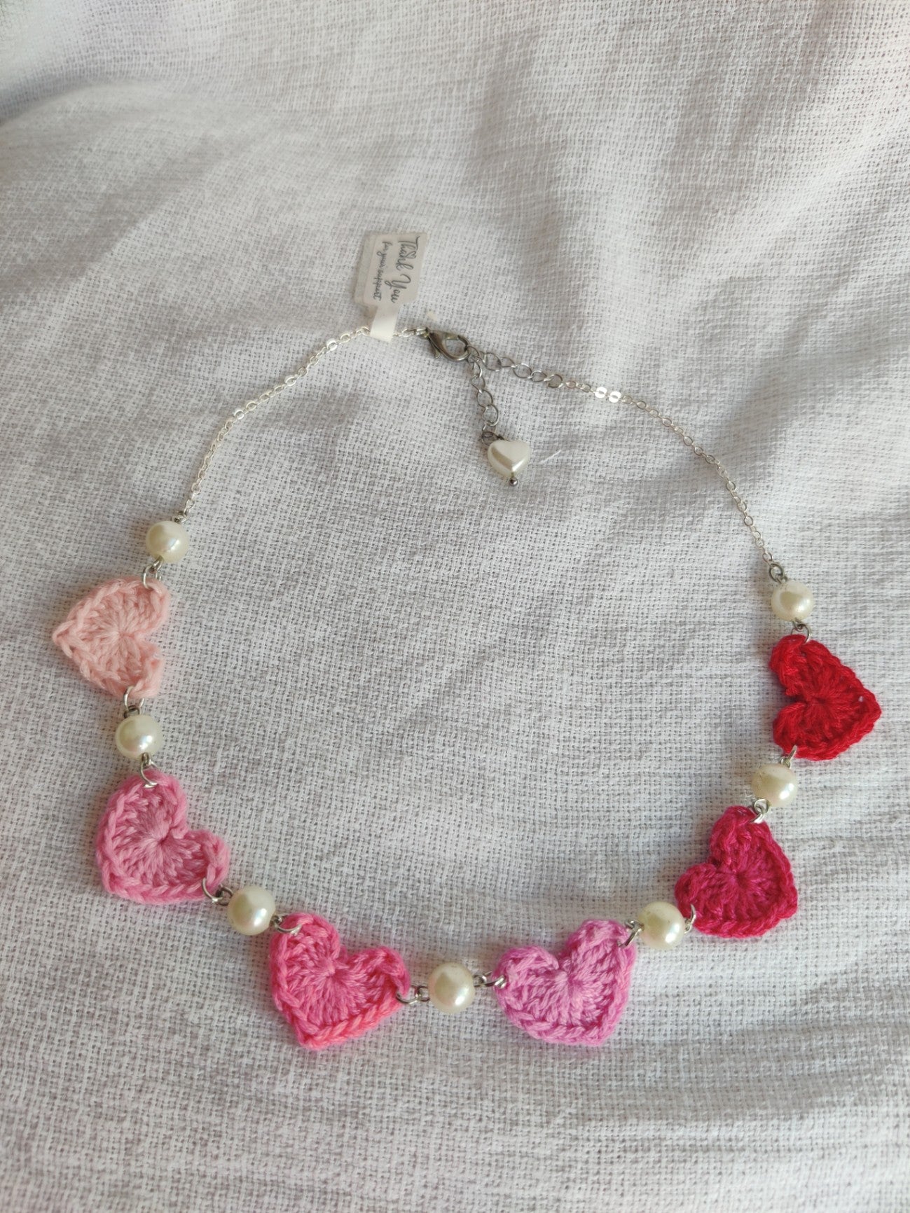 Crochet heart necklace with elegant beads