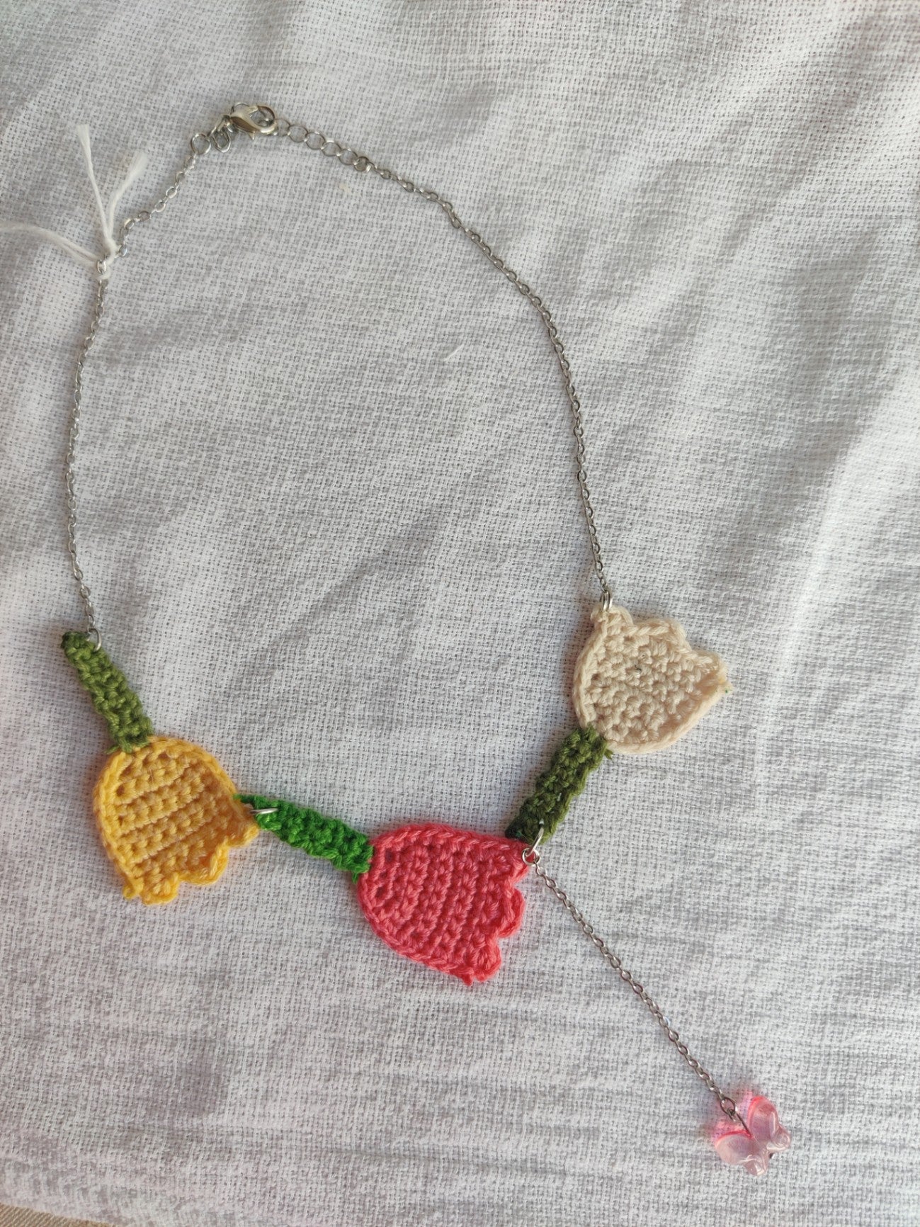 Crochet tulip necklace with glass butterfly bead