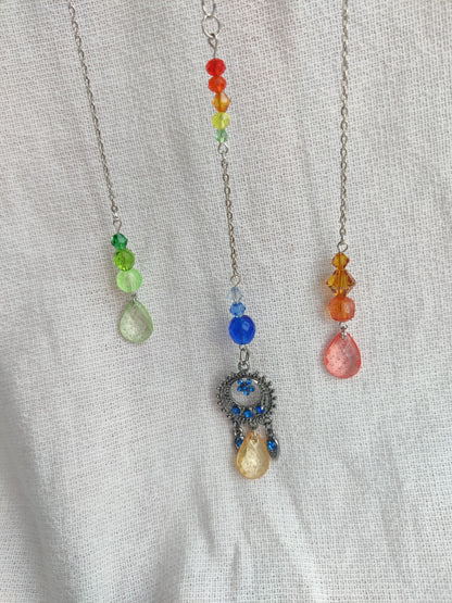 Crochet rainbow cloud suncatcher